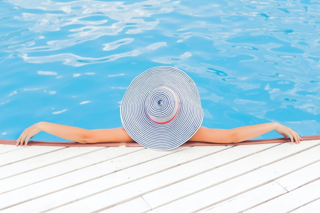homeowner relaxing in pool