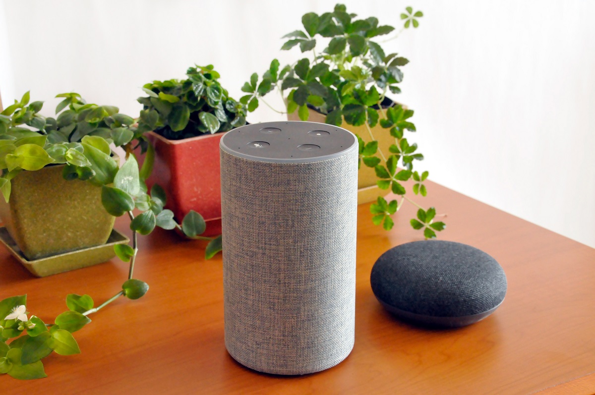 two smart home hubs on a table