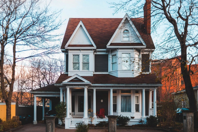 red and white Victorian home