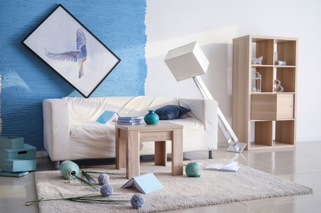 living room disheveled by earthquake