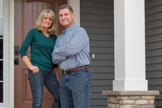 couple in front of door