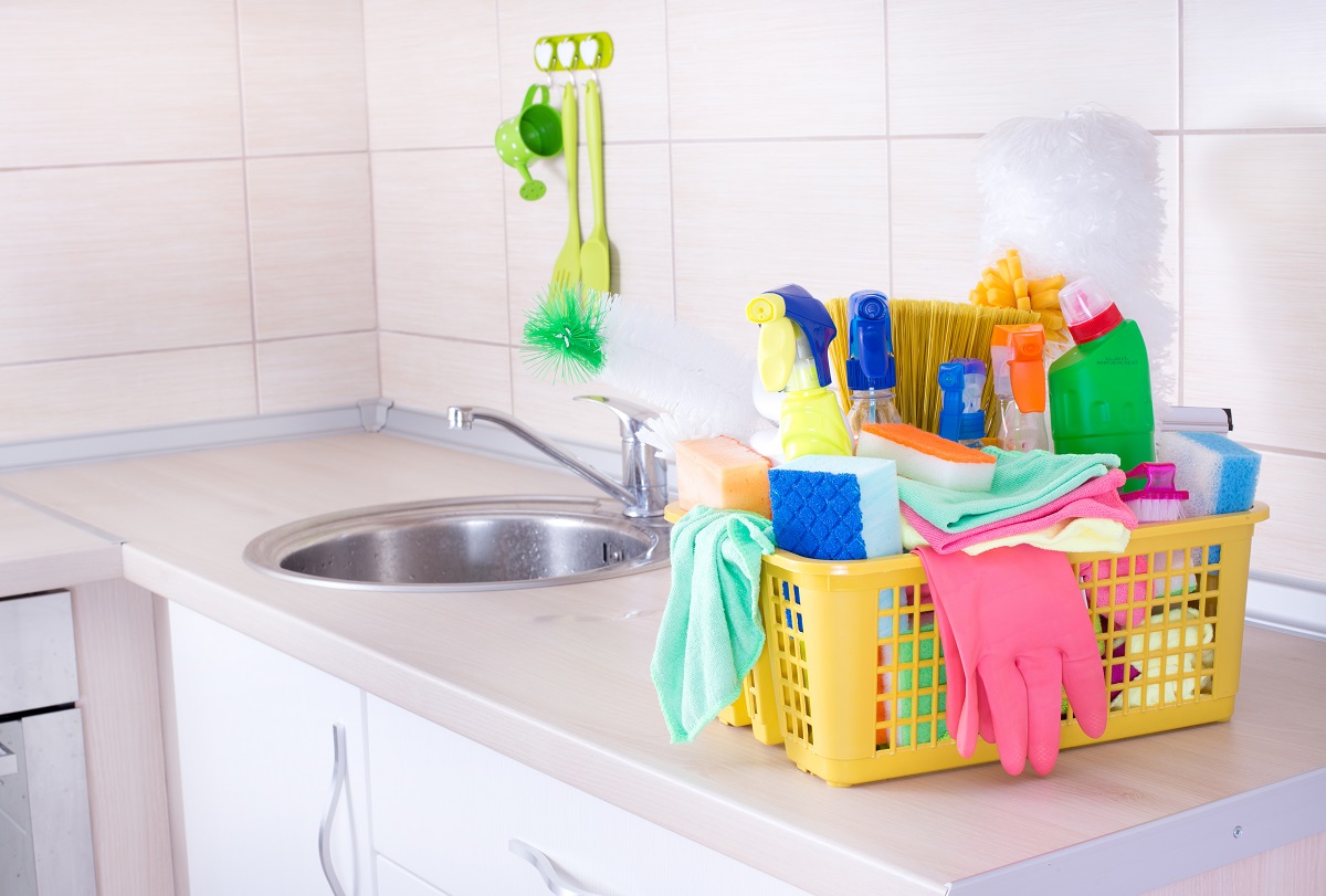 cleaning supplies on a kitchen counter