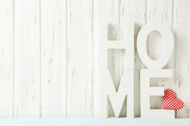 Home in white letters