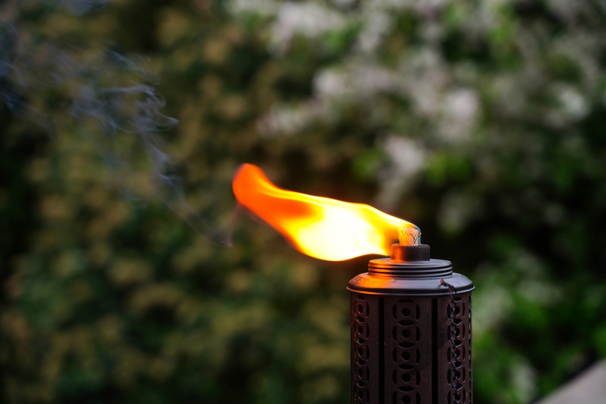 a lit patio torch